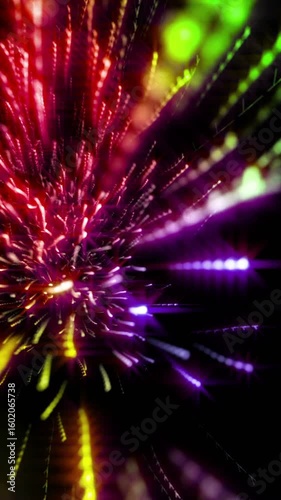 Seamless vertical video animated background of rainbow moving particles