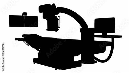 Silhouette of a c arm x ray machine with a monitor and table used for medical imaging procedures