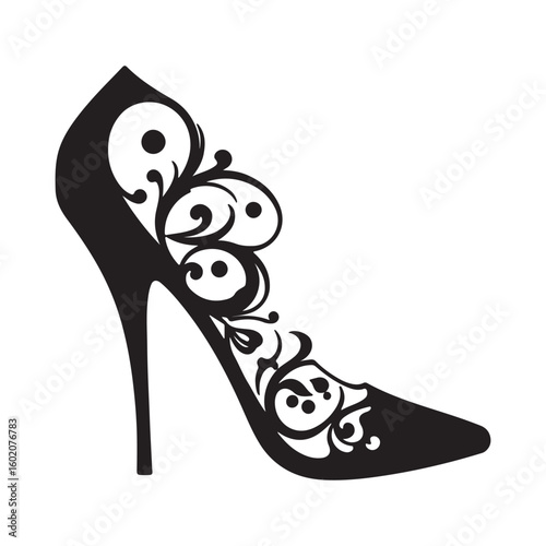 Elegant black high heel shoe with intricate swirling floral vine design and pointed toe
