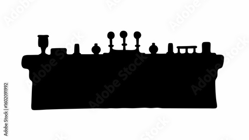 Silhouette of a long bar counter with various bottles and taps displayed on top in a dark solid color