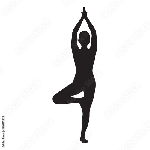 Silhouette of woman performing tree pose yoga asana