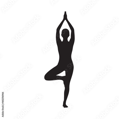 Silhouette of woman in tree yoga pose