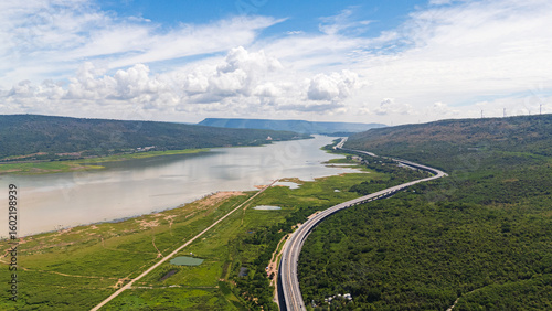 Drone shot The M6 motorway Nakhon Ratchasima Province - Bang Pa-in Lam Ta Khong River and Mountain. Motorway Korat Thailand