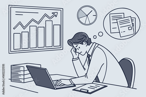 Businessman analyzing data and graphs while working on a laptop in an office setting during a busy workday