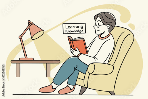 Reading books in a cozy chair under soft lamp light encourages knowledge acquisition and personal growth at home