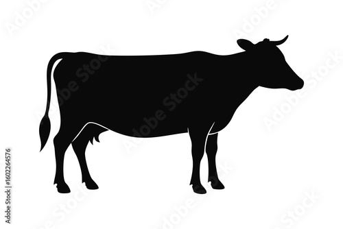 Vector art of black silhouette of a cow standing on a white background