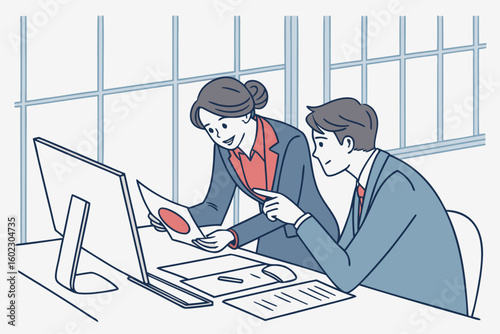 Discussion between business colleagues at a modern office desk with computer and documents during a workday