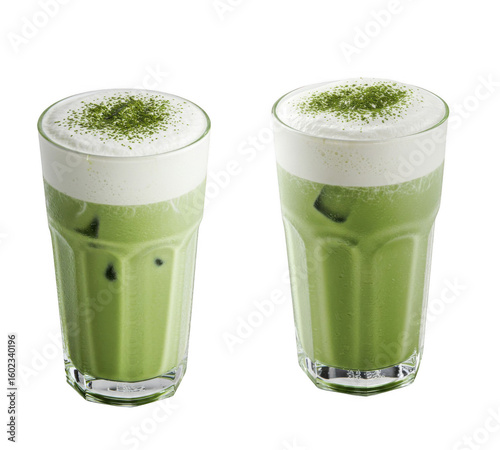 Two refreshing glasses of iced matcha latte with creamy foam and green tea powder topping