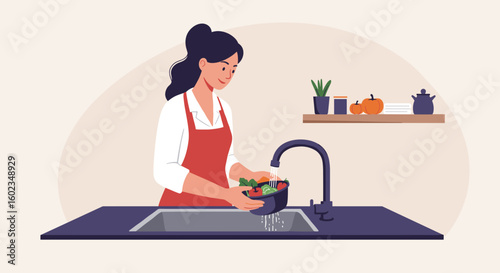Woman washing vegetables in sink while preparing meal in kitchen  