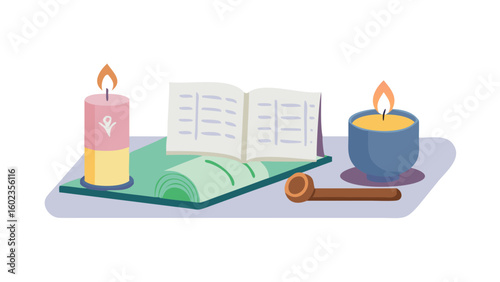 Meditation setup with candles, book and incense