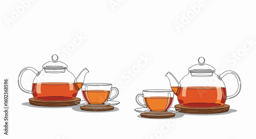 Elegant glass teapots and cups filled with aromatic hot tea served on coasters
