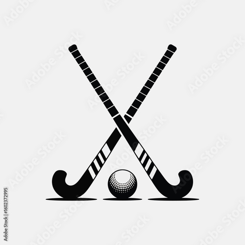 Two crossed hockey sticks and a ball silhouette