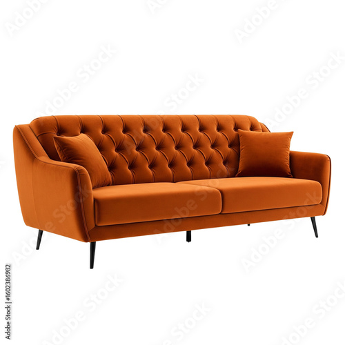 Modern orange sofa with tufted design and plush cushions  