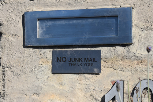 фотографія No junk mail sign on mail letter box