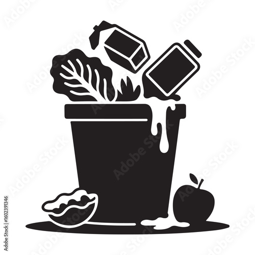 Black silhouette image of food waste in a bin with apple and walnut