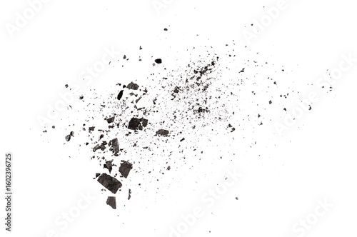 Scattered charcoal dust and broken, isolated texture