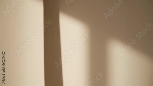 Abstract shadows on a light beige wall