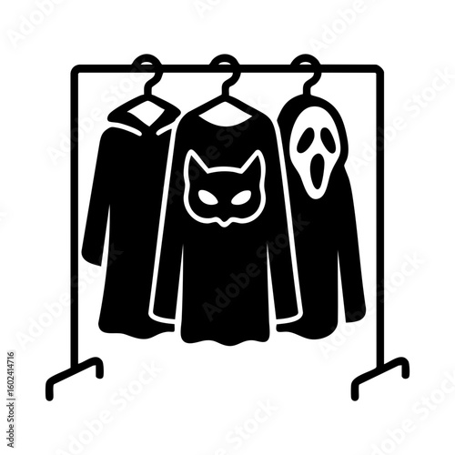 Halloween costumes hanging on rack for party