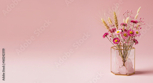 Pink floral arrangement in glass vase for home decor and flower bouquet photography on pink background