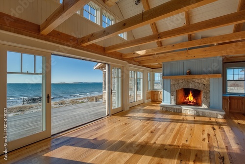 Bright Coastal Living Room with Fireplace and Scenic Ocean View