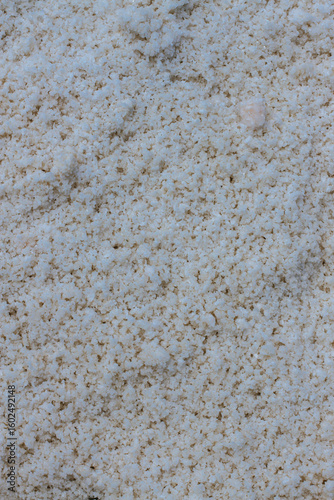 Pyramids of sea salt ready to be harvested in a salt farm at sunrise. Used as a seasoning in food, cosmetics and for food preservation.