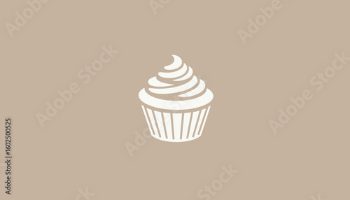 Cupcake with swirled frosting on neutral background  