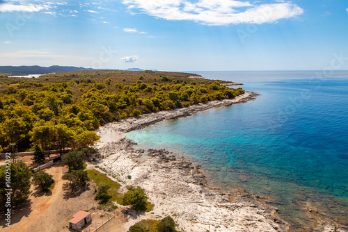 Dugi Otok’s beaches range from the famous sandy Sakarun with turquoise waters to hidden rocky coves and pebble shores, offering stunning, uncrowded spots ideal for nature lovers and photographers.