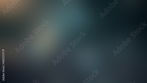 Photo of a dark textured background with a subtle gradient of blue and teal hues