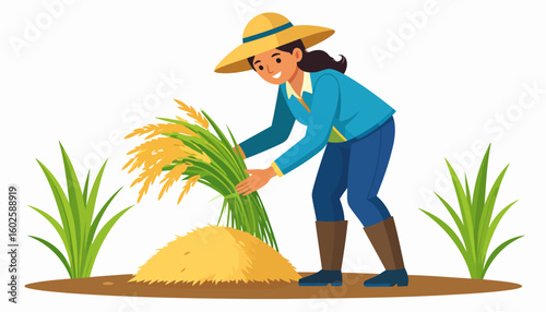 Smiling woman farmer in a yellow hat and boots harvesting a sheaf of golden rice.