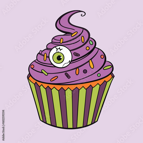 A halloween cupcake with purple frosting and an eyeball decoration