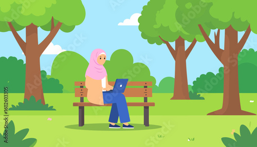 A focused woman in a pink hijab and modest clothing using a blue laptop on a bench.