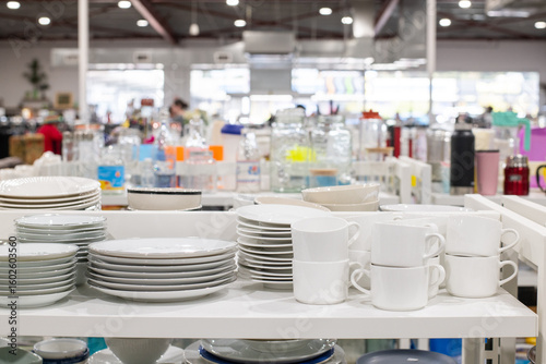 op shop scene, crockery in the foreground