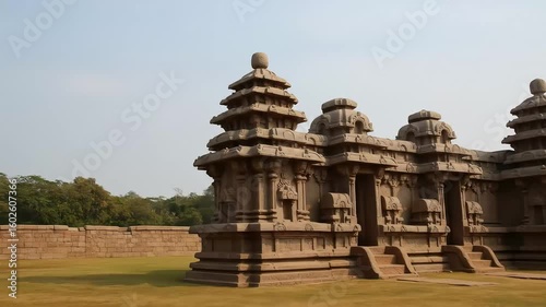 Ancient Stone Temple Architecture Against Blue Sky in Mahabalipuram India