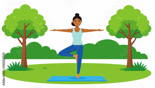 A calm, dark-skinned woman with a top knot bun practicing the Tree Pose yoga asana on a mat.