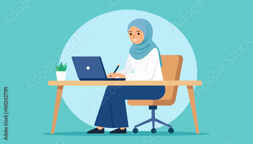 Smiling Muslim woman in a light blue hijab working on a laptop at a wooden desk, with a pleasant and focused expression.