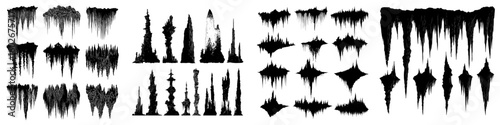Modern stalactites form a black silhouette, isolated natural cave formations