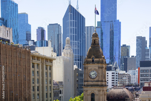 Melbourne CBD showing town hall clock tower, swanston street buildings and sky scrappers