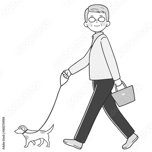 元気に犬の散歩をするシニア男性 モノクロ