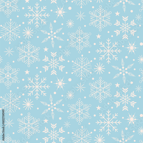 White Christmas snowflakes and stars seamless pattern on powder blue background. For Christmas fabric, textile and wrapping paper