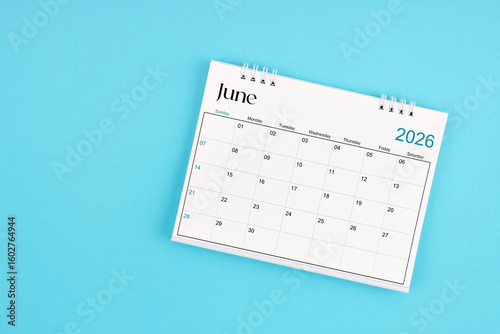 June 2026 Monthly desk calendar for 2026 year on blue color background.