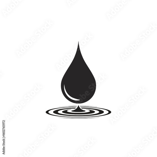 A single black water droplet falling into a series of concentric ripples.