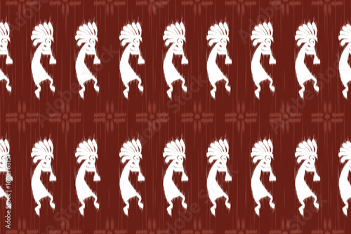 Seamless Tribal Ikat Pattern in Warm Earth Tones. Vector Textile Design.