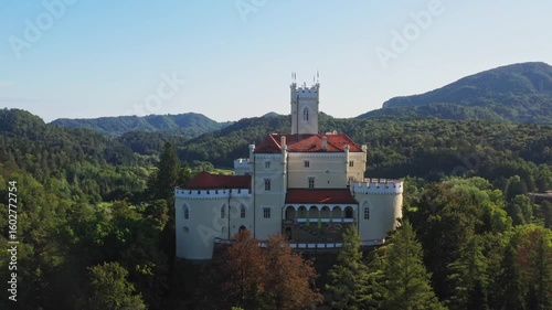 Majestic castle and lake Trakoscan in Zagorje, Croatia, aerial panoramic view.

