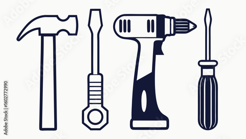 Collection of hand tools and power drill on white background