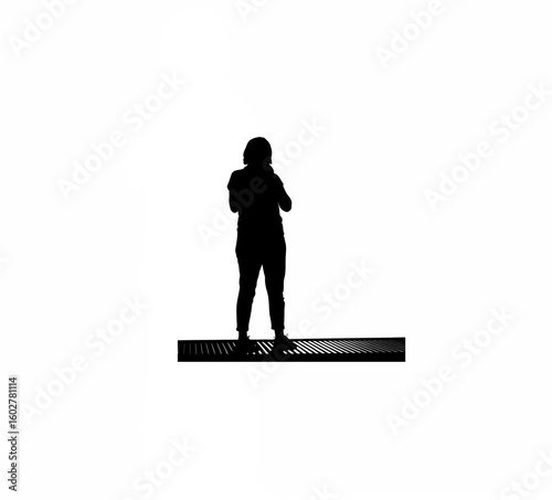 Silhouette of person standing with hands clenched in nervous wait on white background