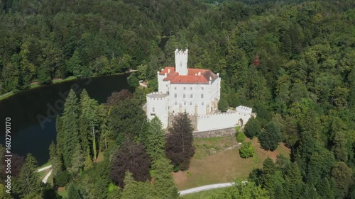 Majestic castle and lake Trakoscan in Zagorje, Croatia, aerial panoramic view.
