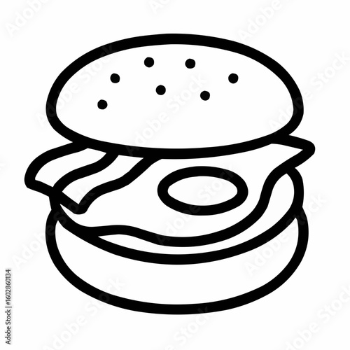 English muffin with egg and bacon peeking out. Minimal layers shown