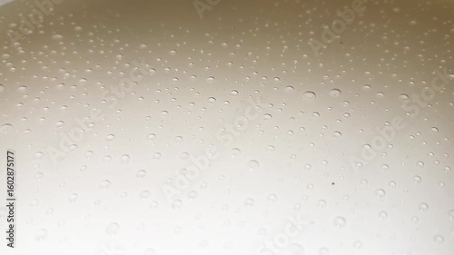 Abstract water drops on a white background, macro. Bubbles close-up. Drops of cosmetic liquid. Flat pattern. Condensation from water.