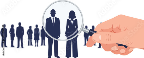 Finding talent, magnifying glass focuses on business people silhouettes