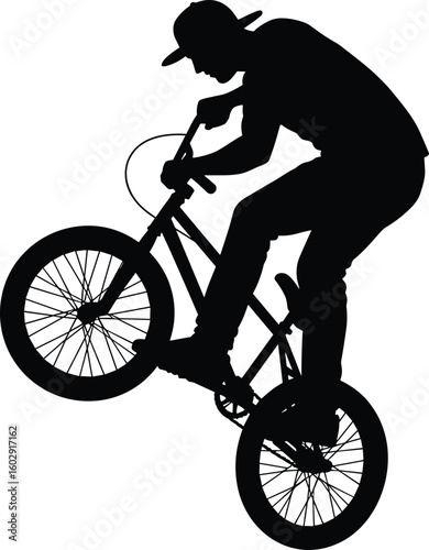 Silhouette of a BMX cyclist performing stunt in mid-air, extreme sports, action shot, outdoor adventure, freestyle biking motion.